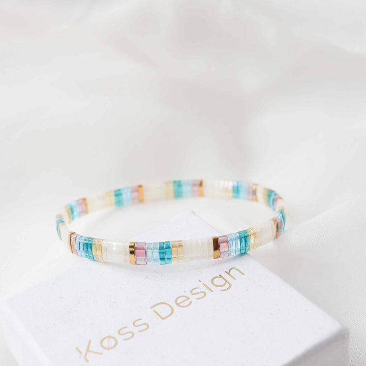 Poly - bracelet en perles Miyuki porté au poignet