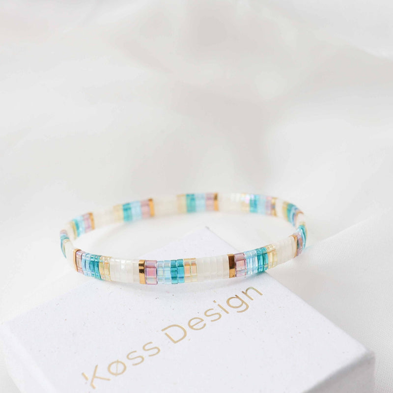 Poly - bracelet en perles Miyuki porté au poignet
